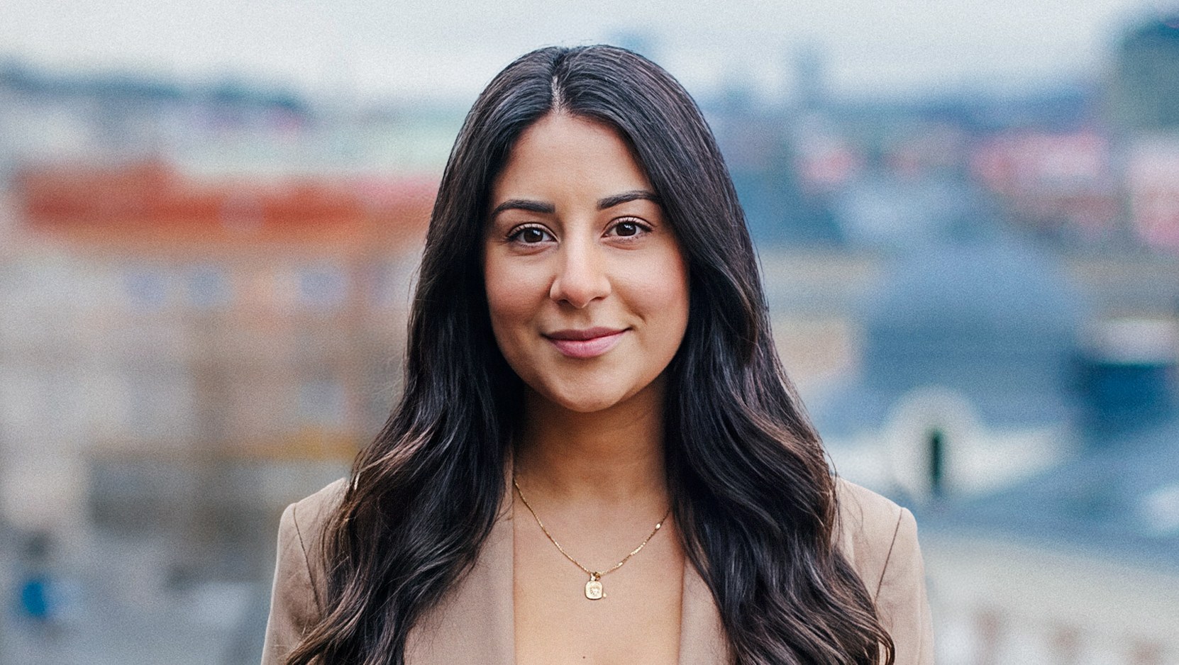 Vera Roshan, who works with human resources at Stendahls, on a rooftop terrace above the city.