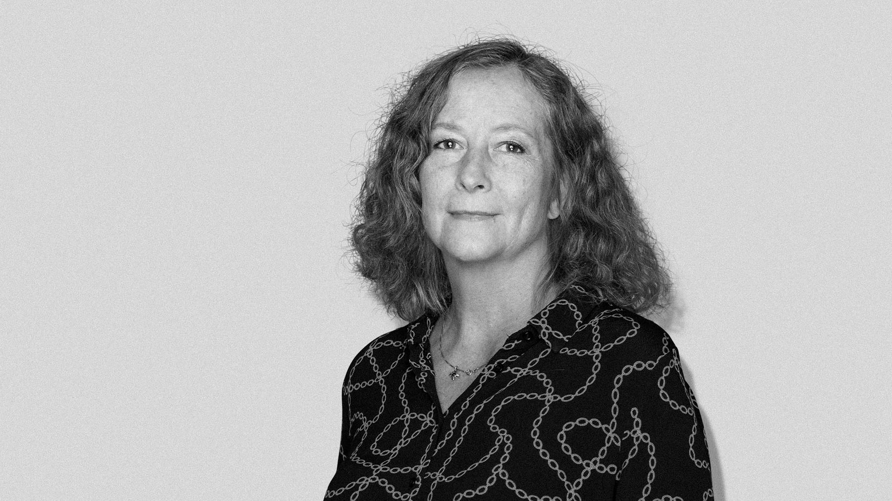 Black-and-white studio portrait of Karin Andersson, Art Director at Stendahls.