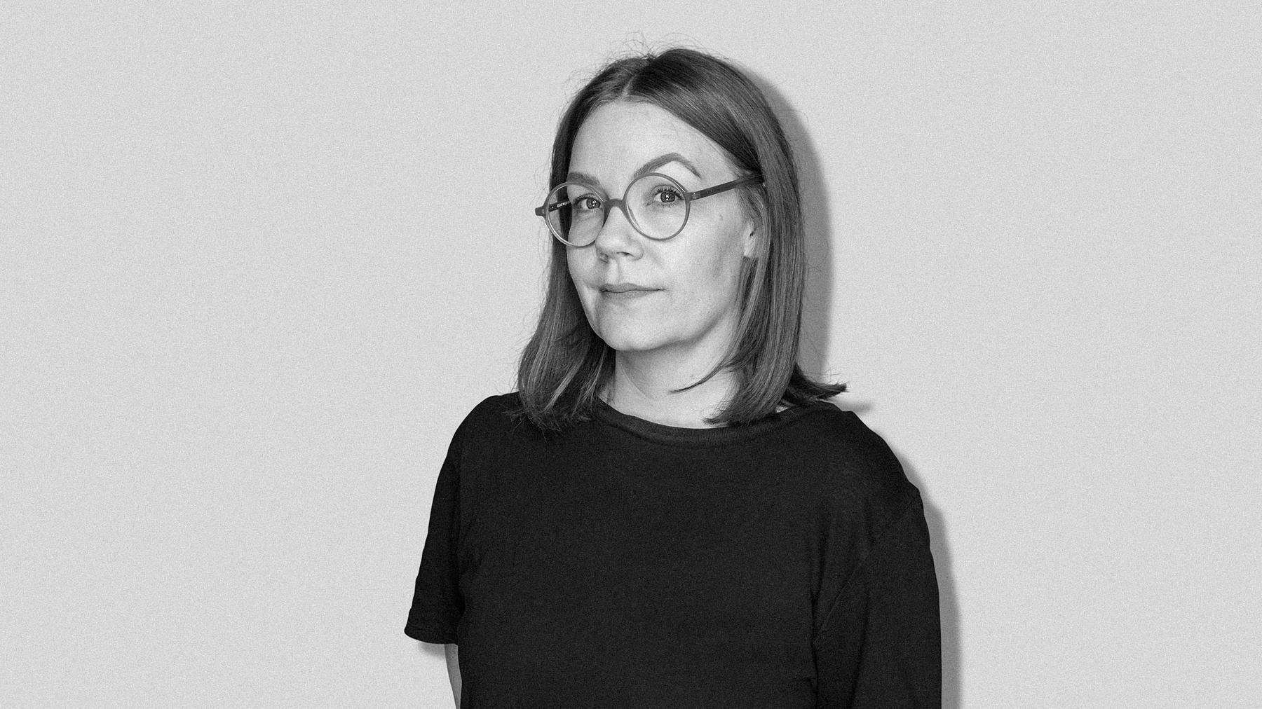Black-and-white studio portrait of Klara Persson, Designer at Stendahls.