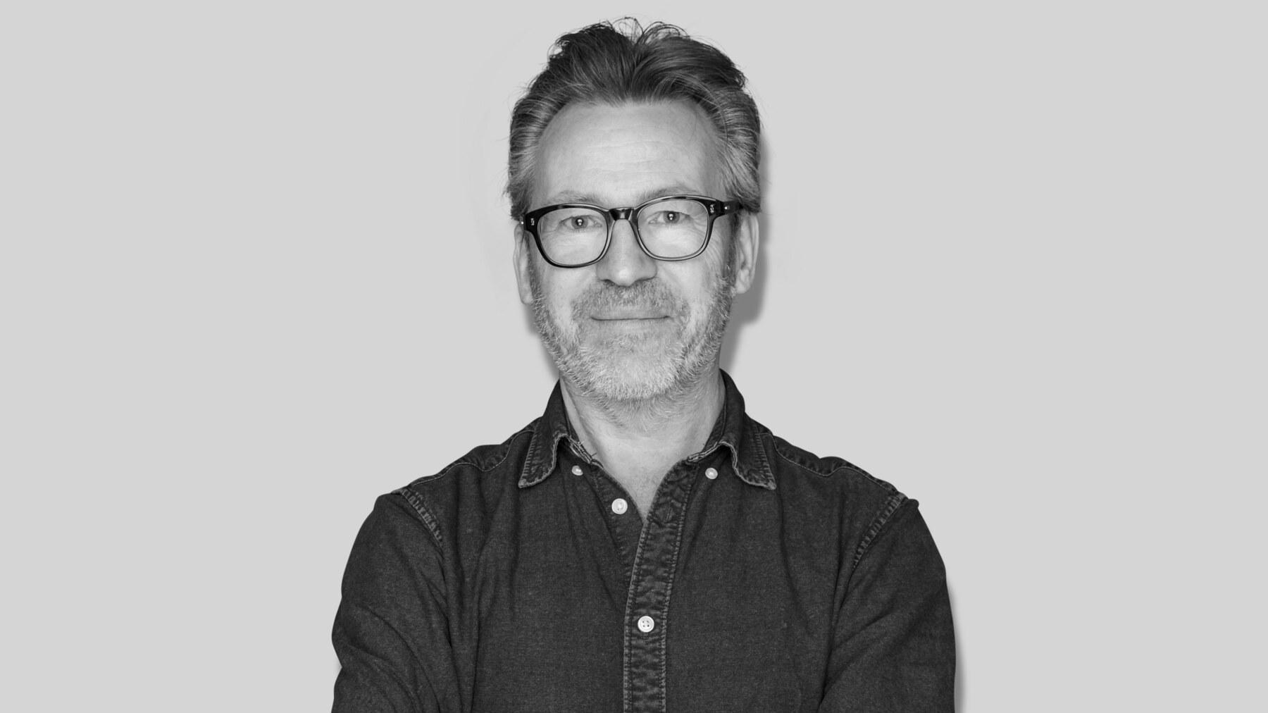Black-and-white studio portrait of Peter Ohlsson, Client Director at Stendahls.