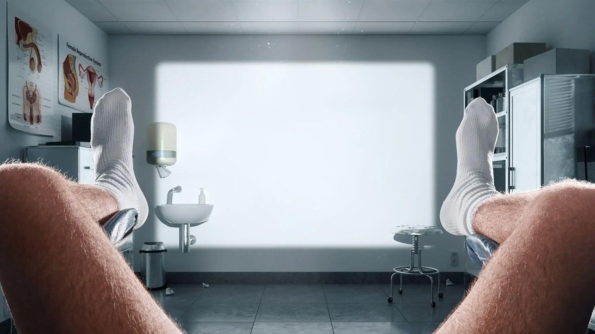 View from the gynecological chair: sock-clad legs in stirrups facing a glowing cinema screen on the clinic wall.