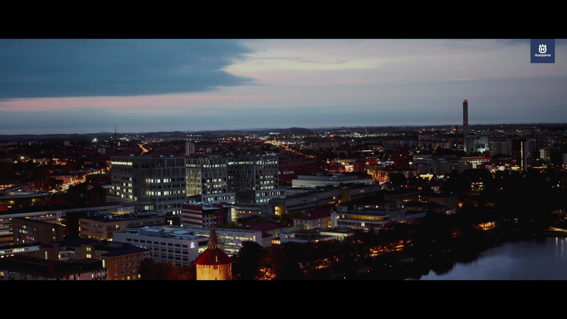 The 'For what matters' campaign film – a city skyline at dusk under the Husqvarna logo.