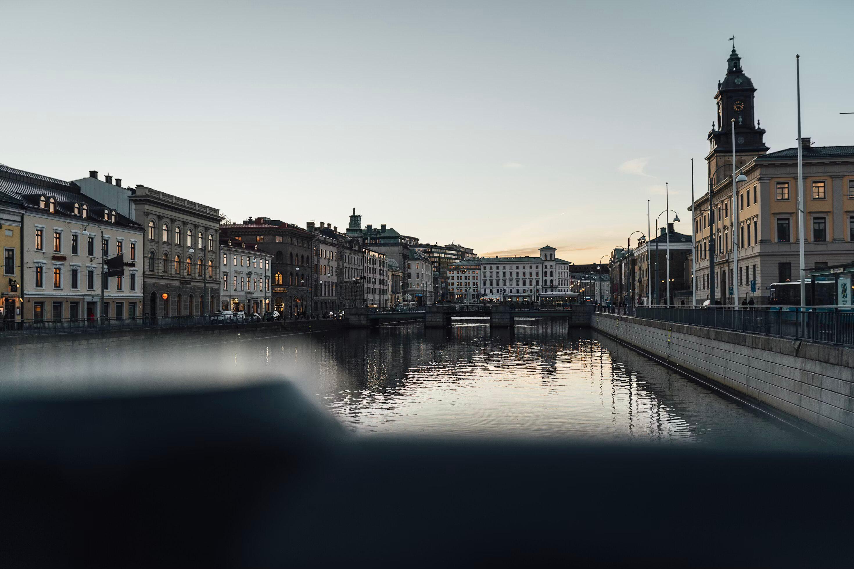 Canal-side buildings in central Gothenburg at dusk.